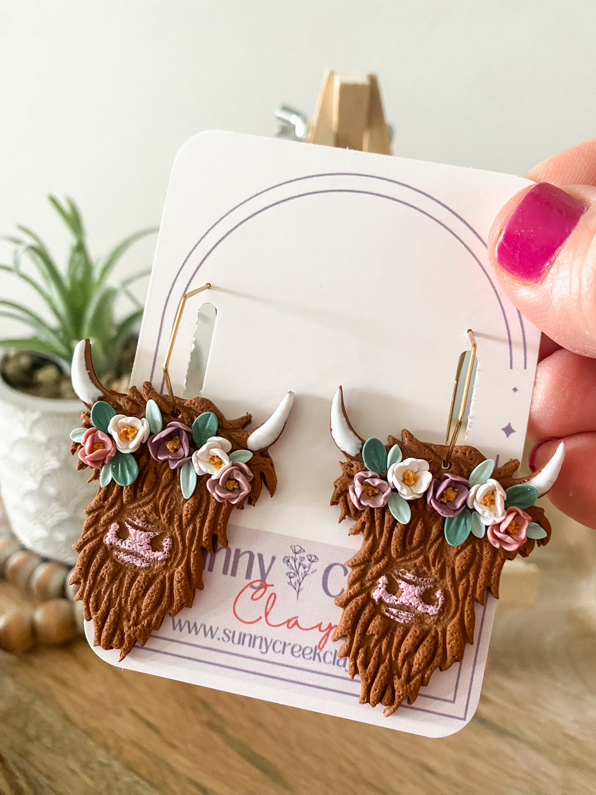 Highland cow with flower crown