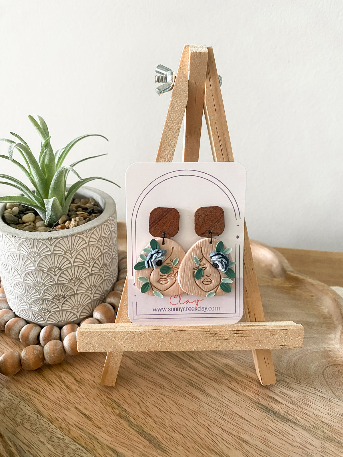 Tan blue floral earrings