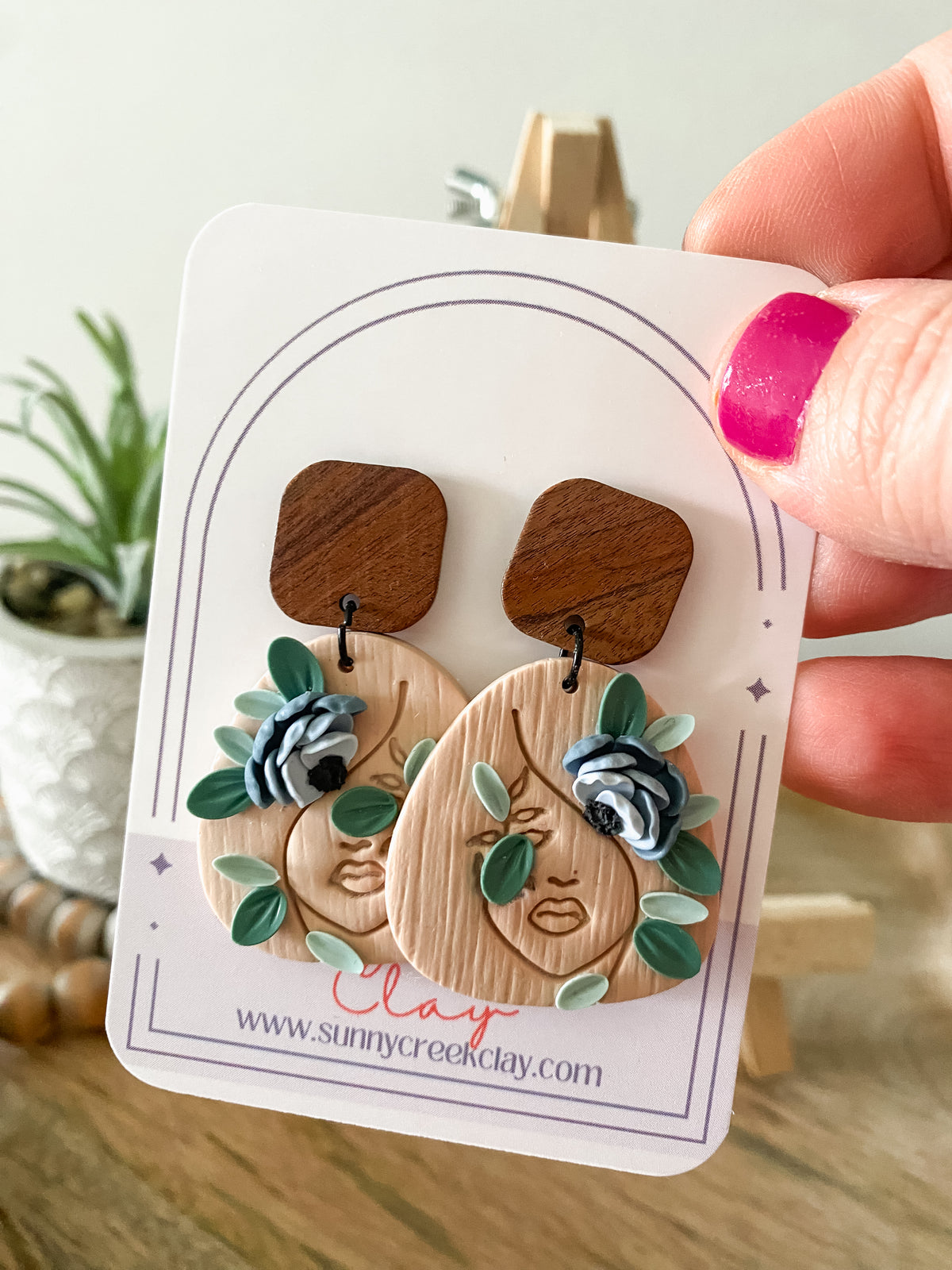 Tan blue floral earrings