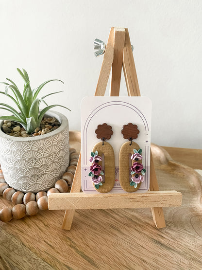 Oval tan and purple floral earrings