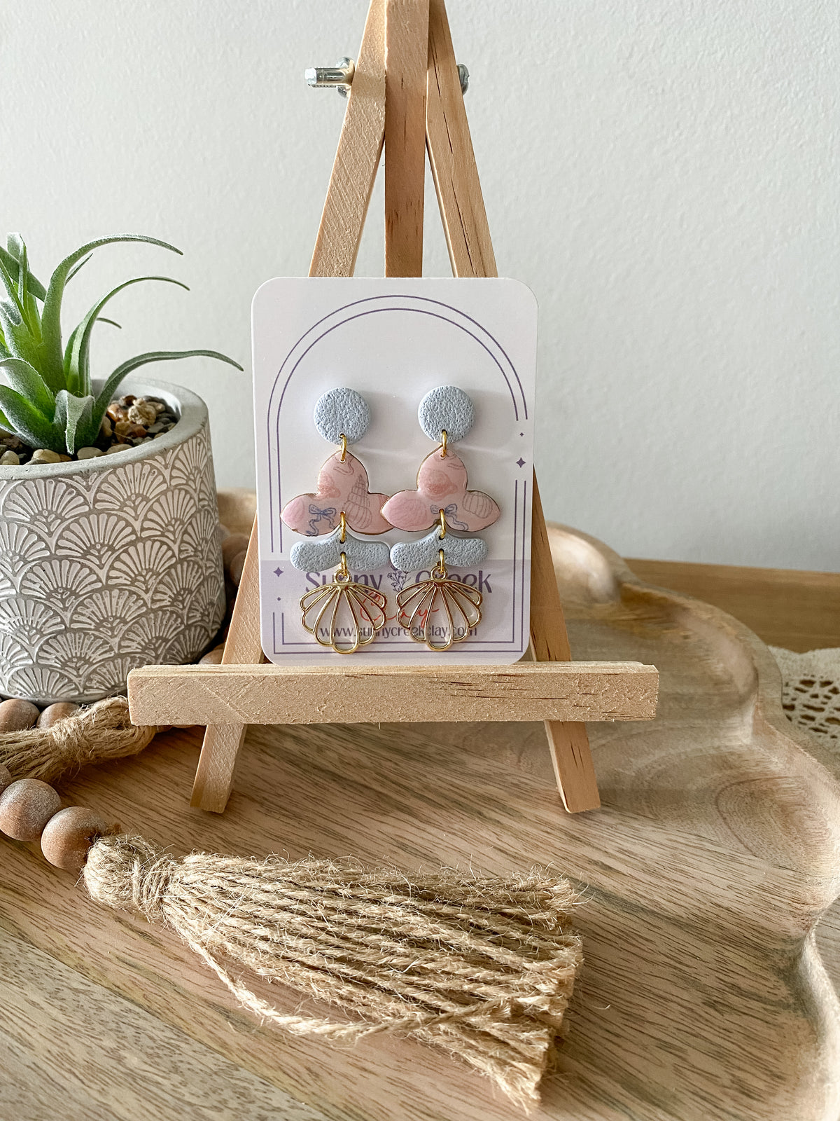 Soft coastal print handmade polymer clay earring collection