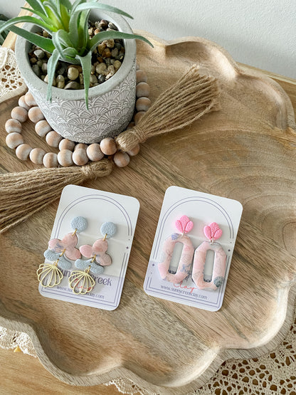 Soft coastal print handmade polymer clay earring collection