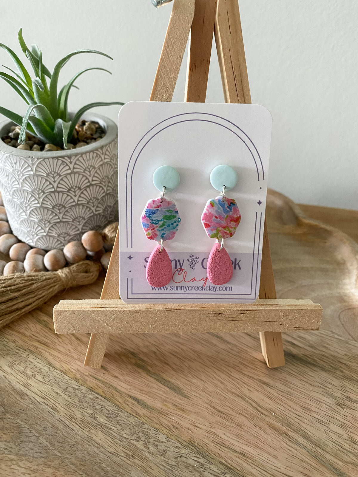 Soft paint splatter print handmade polymer clay earring collection