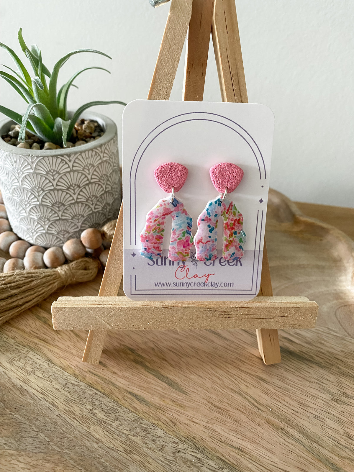 Soft paint splatter print handmade polymer clay earring collection
