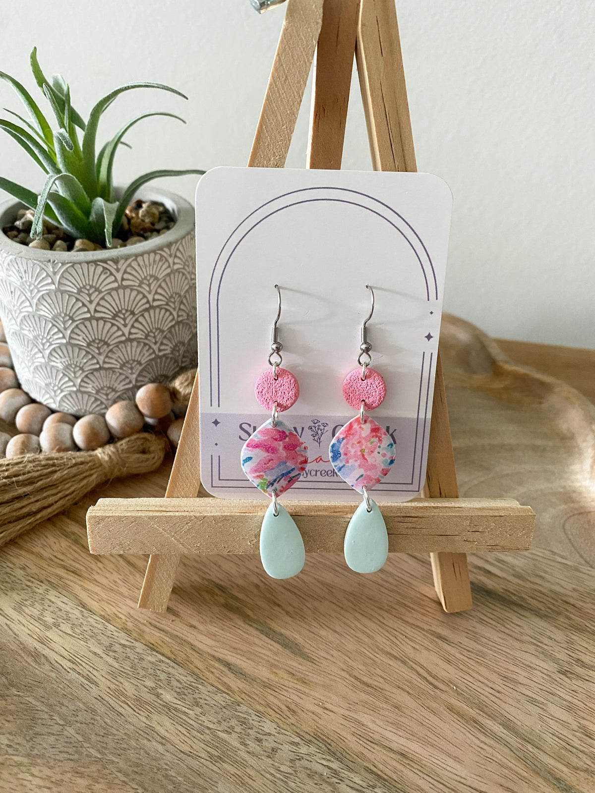 Soft paint splatter print handmade polymer clay earring collection
