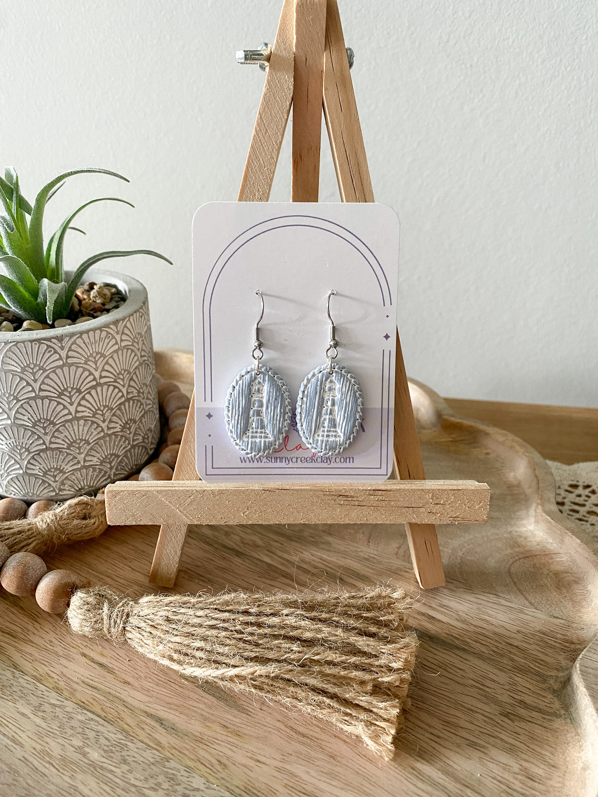 Soft blue coastal handmade polymer clay earring collection