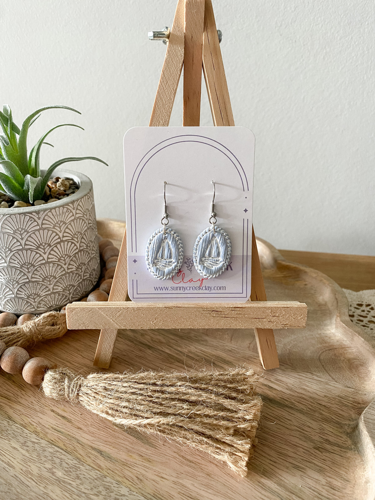 Soft blue coastal handmade polymer clay earring collection