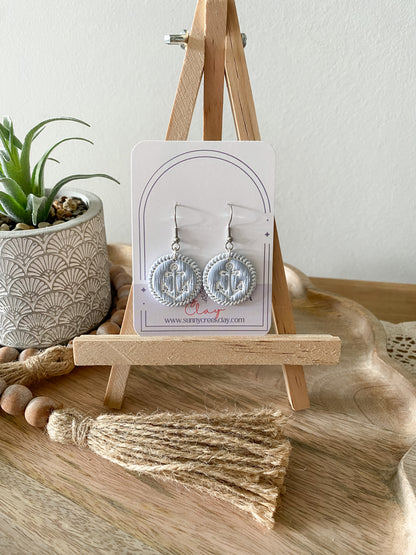 Soft blue coastal handmade polymer clay earring collection