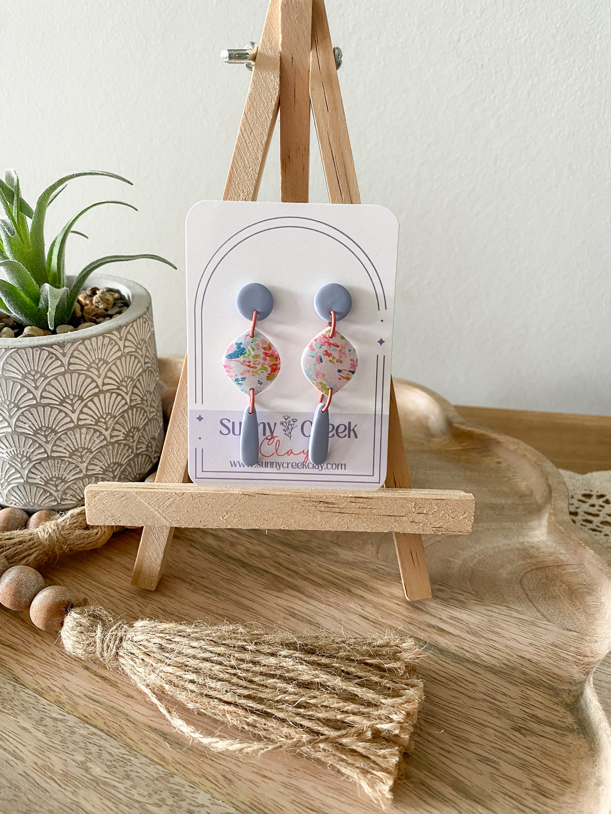Soft paint splatter print handmade polymer clay earring collection