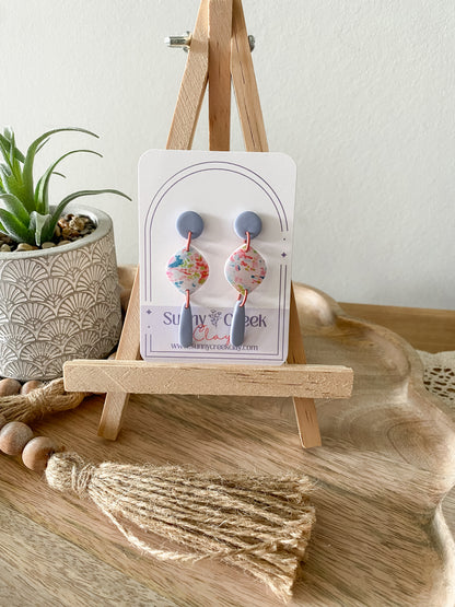 Soft paint splatter print handmade polymer clay earring collection