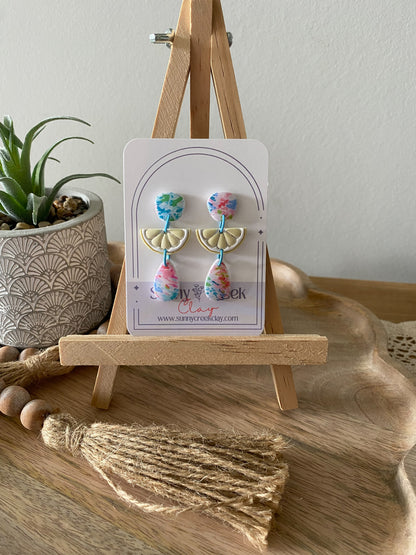 Soft paint splatter print handmade polymer clay earring collection