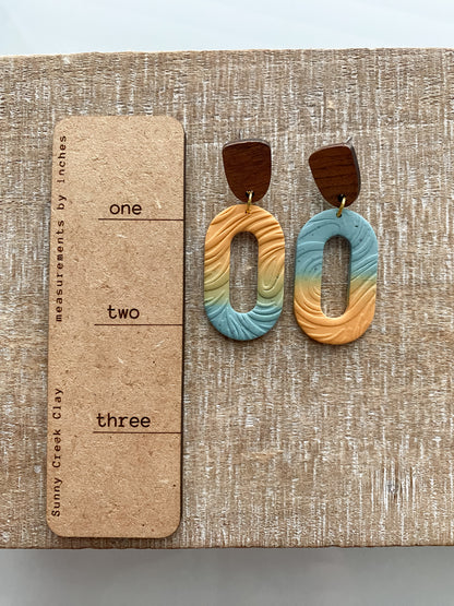 Blue and orange ombre oval earrings