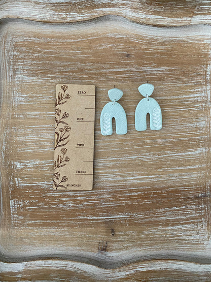 Flower imprint arch dangle earrings