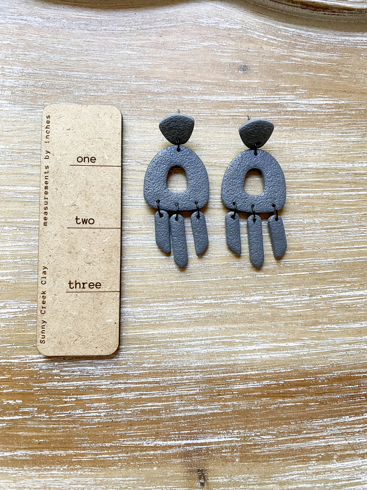 Grey handmade polymer clay earring collection
