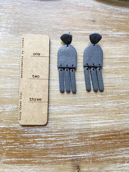 Grey handmade polymer clay earring collection