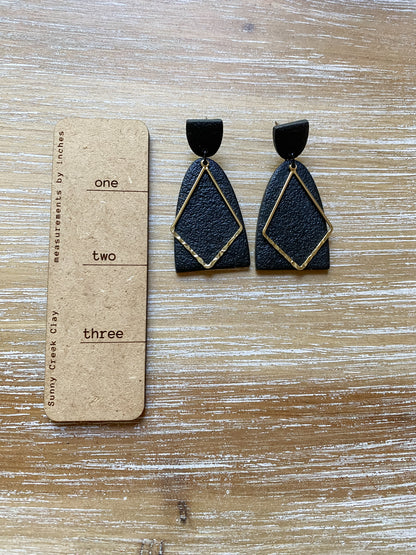 Tall black and gold polymer clay earrings