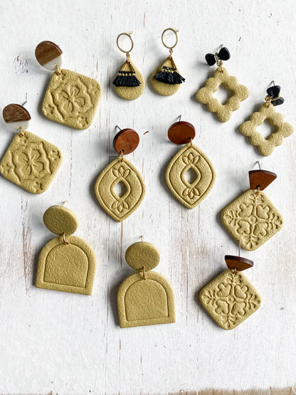 Yellow handmade polymer clay earring collection